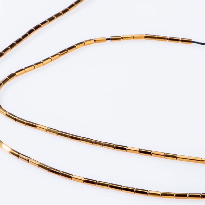 Hematit placat auriu tuburi fatetate 2x4 mm I Magazinuldepietre.ro