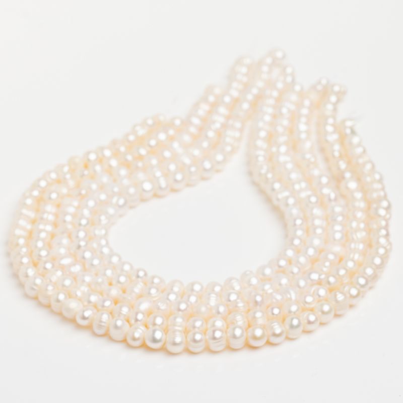Pietre Semipretioase - Perle de cultura alb oval 7-8 mm V1