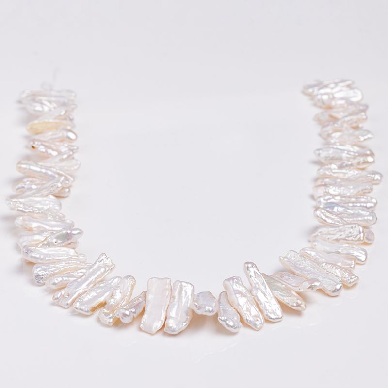 Perle alb colti 25 mm in magazinuldepietre.ro